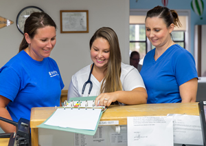 Baptist nurse residency nurses overlooking patient chart