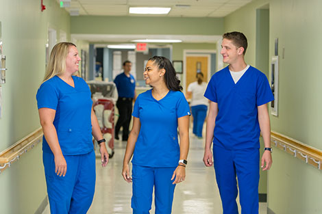 Baptist nurse residency nurses overlooking patient chart