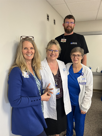 Group of nursing professionals standing together for photo