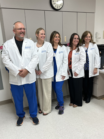 Group of nursing professionals standing together for picture